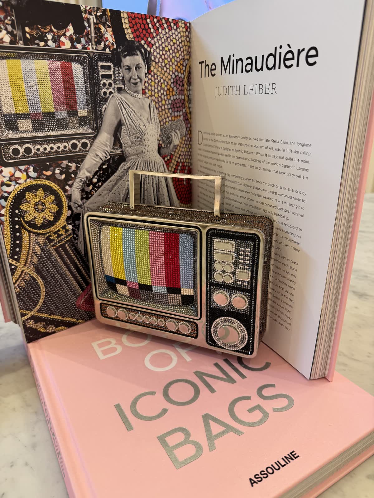 Assouline Iconic Bags book featuring a Judith Leiber minaudière