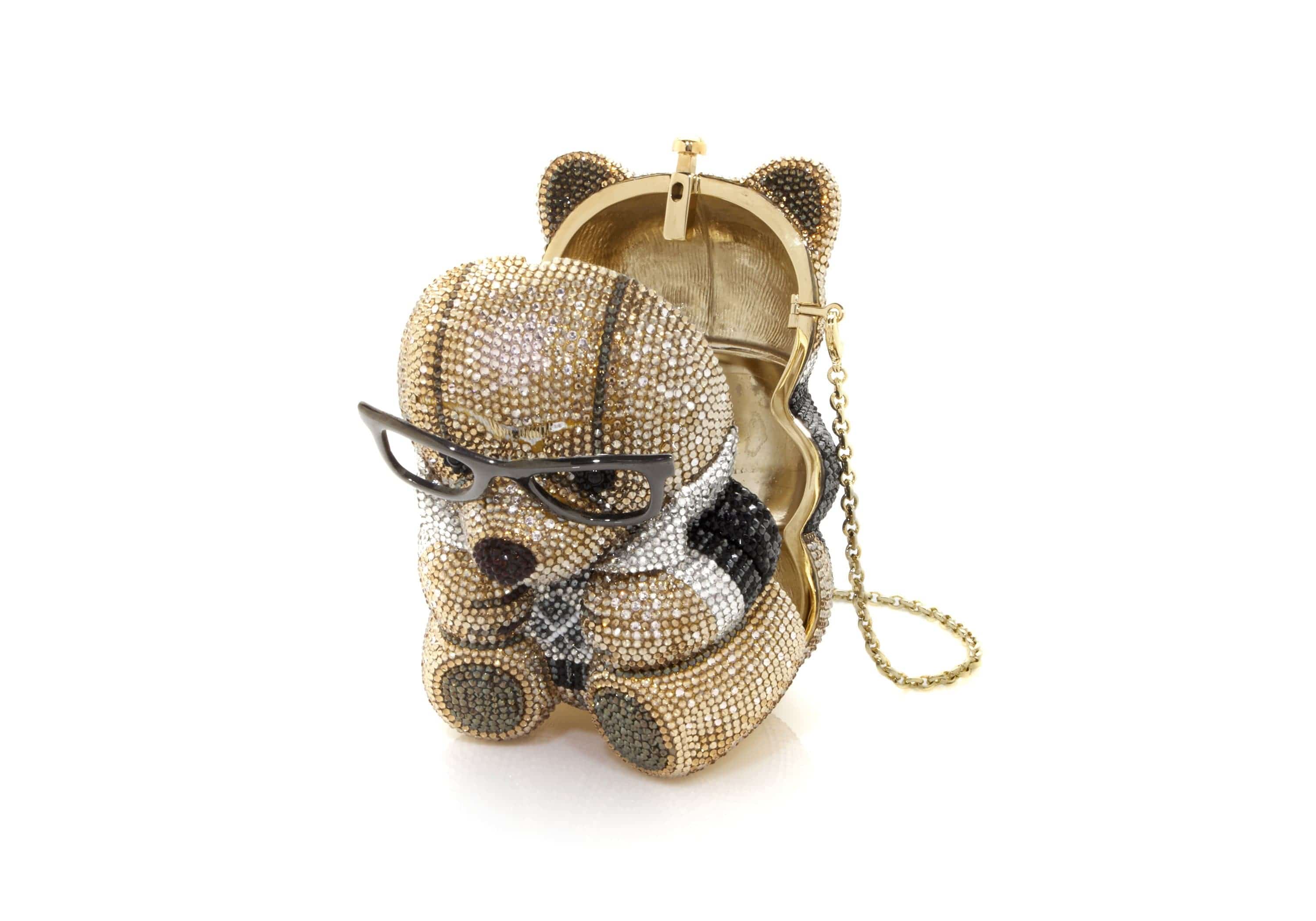 Redefine your elegance with me as I don the Embellished Harrods Bear Clutch  Purse by Judith Leiber. This purse isn't just a fashion…